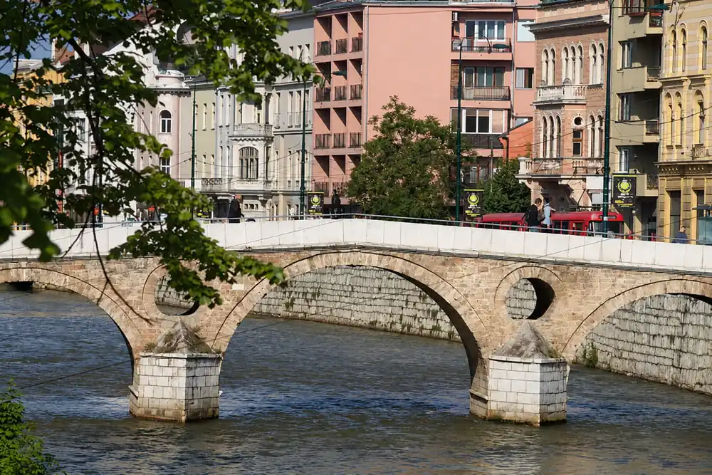 Stone arches of Latin Bridge over the Miljacka River in Sarajevo